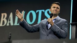 Video footage from the event at Utah Valley University shows conservative commentator Charlie Kirk sitting under a canopy when he suddenly falls back and a loud pop can be heard. Video footage from the event at Utah Valley University shows conservative commentator Charlie Kirk sitting under a canopy when he suddenly falls back and a loud pop can be heard.