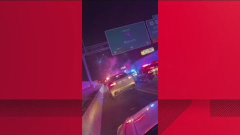 A Clayton County sheriff's deputy was pulled from his cruiser after it was pushed into guardrail and overturned in a chain reaction crash caused by a fleeing suspect.