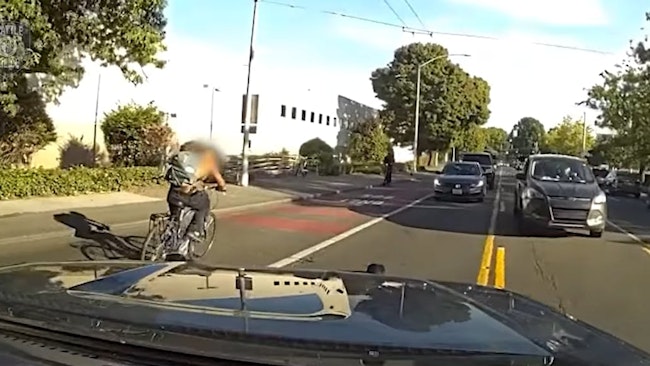 Footage from a real-time crime center and a dashboard camera captured a man stabbed multiple time before Seattle police apprehended the suspect who tried to flee on a bicycle.
