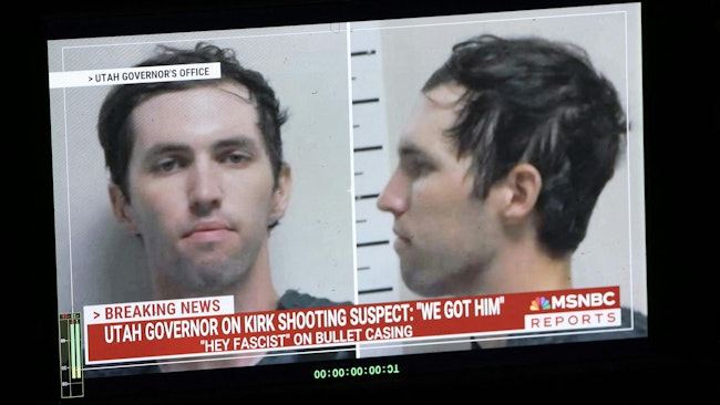 A TV monitor displays a picture of Tyler Robinson, who was arrested Friday in connection with the killing of conservative commentator Charlie Kirk at a college event in Orem, UT,