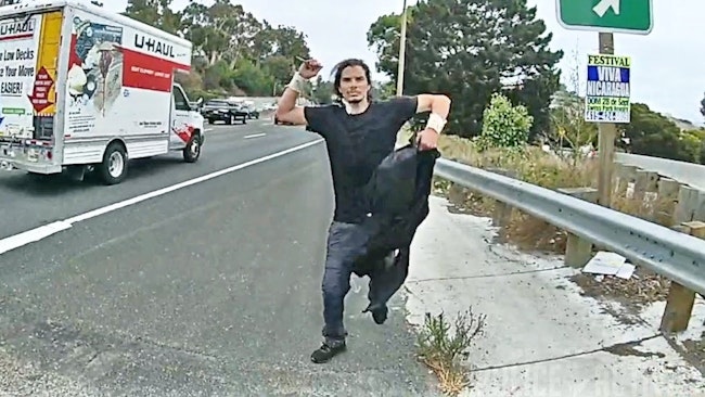 When San Francisco police responded to reports of a man jumping over a retaining wall and walking on the freeway, the suspect moved toward an officer, making downward stabbing motions before he was shot in the chest.