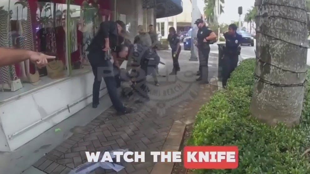 A Miami Beach police officer required stitches after being headbutted while trying to arrest a suspect armed with a knife and carrying accelerant who was acting erratically and threatening to set himself on fire.