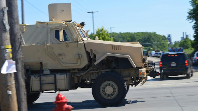 An armored vehicle was part of the law enforcement response July 23 after a gunman opened fire on Lorain, OH, police, killing one officer and wounding two others.
