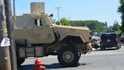 An armored vehicle was part of the law enforcement response July 23 after a gunman opened fire on Lorain, OH, police, killing one officer and wounding two others. An armored vehicle was part of the law enforcement response July 23 after a gunman opened fire on Lorain, OH, police, killing one officer and wounding two others.