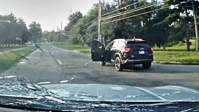 Newly released footage shows Indianapolis police exchanging gunfire with a man accused of killing his wife in a chaotic shootout that erupted during a vehicle chase.