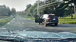 Newly released footage shows Indianapolis police exchanging gunfire with a man accused of killing his wife in a chaotic shootout that erupted during a vehicle chase.
