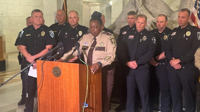 Hennepin County, MN, Sheriff Dawanna Witt—flanked by county police chiefs—speaks out against a new policy from Hennepin County Attorney Mary Moriarty limiting felony charges stemming from low-level traffic stops.