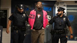 Aaron Walker is accused of punching an off-duty NYPD officer in the back of the head and throwing him onto subway tracks Wednesday. Aaron Walker is accused of punching an off-duty NYPD officer in the back of the head and throwing him onto subway tracks Wednesday.