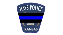 When a Hays police officer was arriving at the scene of a domestic violence call, a suspect opened fire, and the officer was fatally struck. When a Hays police officer was arriving at the scene of a domestic violence call, a suspect opened fire, and the officer was fatally struck.