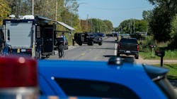 The Michigan State Police Bomb Squad investigates a home in Burton after a shooting and structure fire at the Church of Jesus Christ of Latter-day Saints in Grand Blanc Township on Sunday. The Michigan State Police Bomb Squad investigates a home in Burton after a shooting and structure fire at the Church of Jesus Christ of Latter-day Saints in Grand Blanc Township on Sunday.