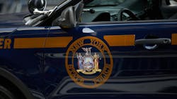 A New York State Police trooper was injured Friday when a cargo van crashed into the officer's cruiser during a traffic stop near Schroon Lake in Essex County, killing a passenger in the van. A New York State Police trooper was injured Friday when a cargo van crashed into the officer's cruiser during a traffic stop near Schroon Lake in Essex County, killing a passenger in the van.