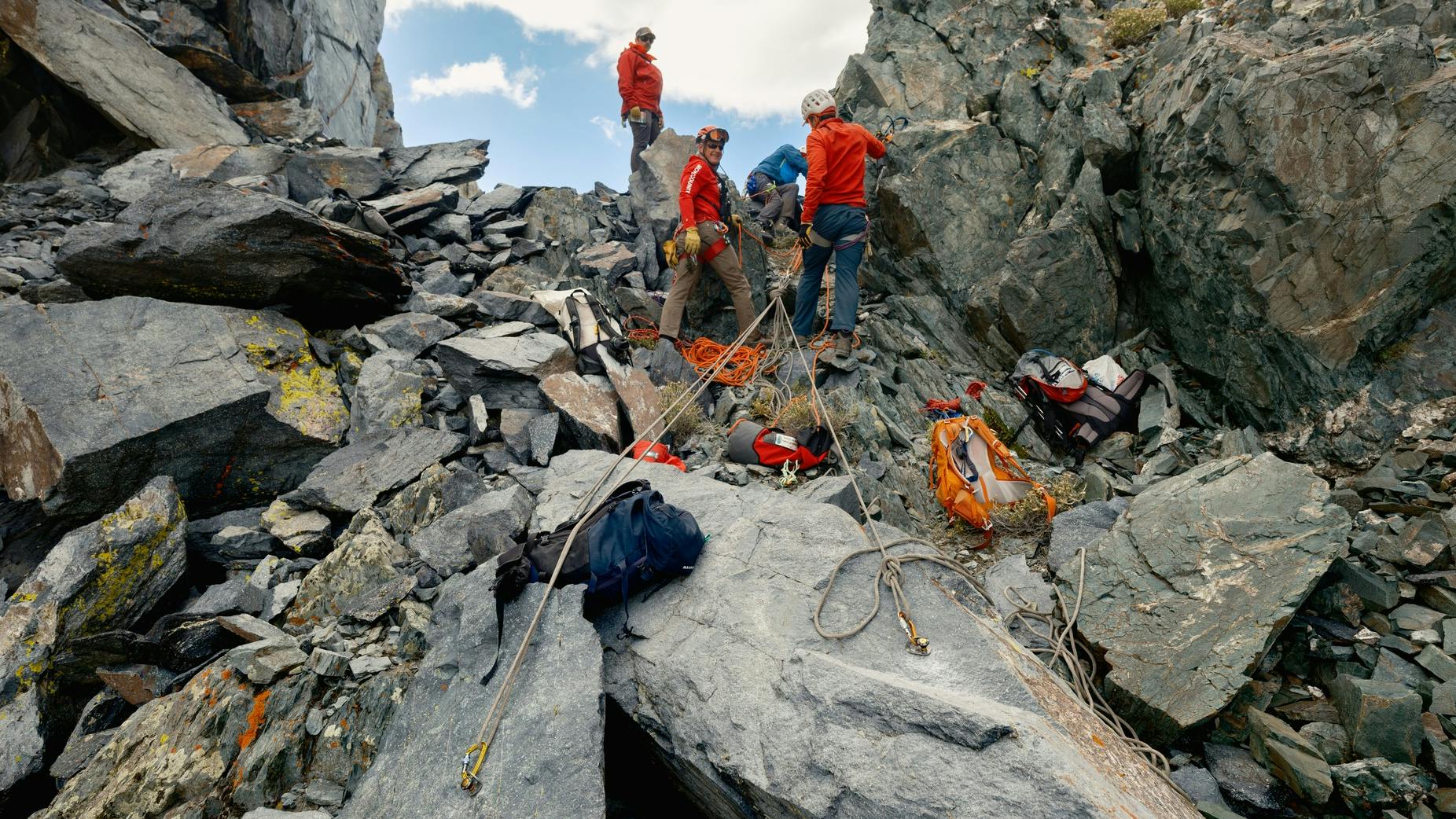 Members of the Mono County, CA, Sheriff Search and Rescue Team rigged ropes to retrieve one of the two backpackers trapped on an icy ridge north of Yosemite National Park on Tuesday, Oct. 7.