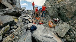 Members of the Mono County, CA, Sheriff Search and Rescue Team rigged ropes to retrieve one of the two backpackers trapped on an icy ridge north of Yosemite National Park on Tuesday, Oct. 7. Members of the Mono County, CA, Sheriff Search and Rescue Team rigged ropes to retrieve one of the two backpackers trapped on an icy ridge north of Yosemite National Park on Tuesday, Oct. 7.