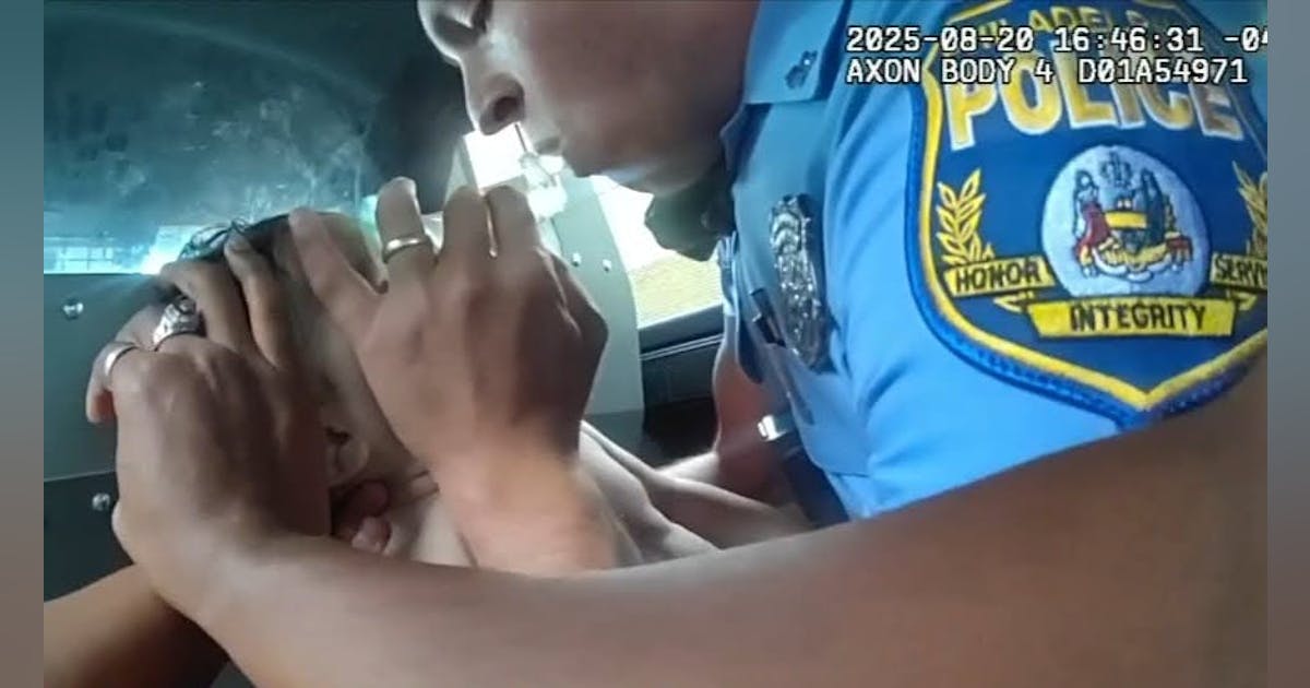 Watch Philadelphia Police Officers Perform Backseat CPR on Child