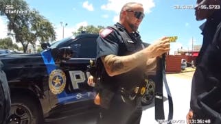 A Stafford, TX, police officer on patrol helps a young man with an unusual request: Help him tie his tie so he can make a good impression at his first-ever job interview.
