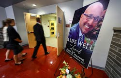 Family, friends and members of the community gather at Phillipsburg, NJ, High School's auditorium Saturday for a memorial service in honor of Officer Brett Marino. Family, friends and members of the community gather at Phillipsburg, NJ, High School's auditorium Saturday for a memorial service in honor of Officer Brett Marino.