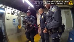 NYPD officers rescued a dog that was found curled up under a train on the tracks at a Manhattan subway station after running away from a boarding facility during morning rush hour Thursday. NYPD officers rescued a dog that was found curled up under a train on the tracks at a Manhattan subway station after running away from a boarding facility during morning rush hour Thursday.