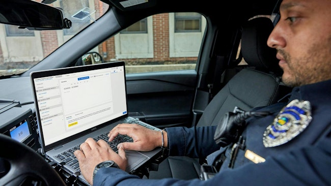 A police officer uses Axon Draft One to create a report. Beginning Jan. 1, California police officers must disclose when generative AI software tools are used in helping to create an official report.