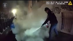 Seattle police officers used extinguishers early Monday to douse the flames that had engulfed a sleeping man after they spread to his clothes while he was sleeping. Seattle police officers used extinguishers early Monday to douse the flames that had engulfed a sleeping man after they spread to his clothes while he was sleeping.