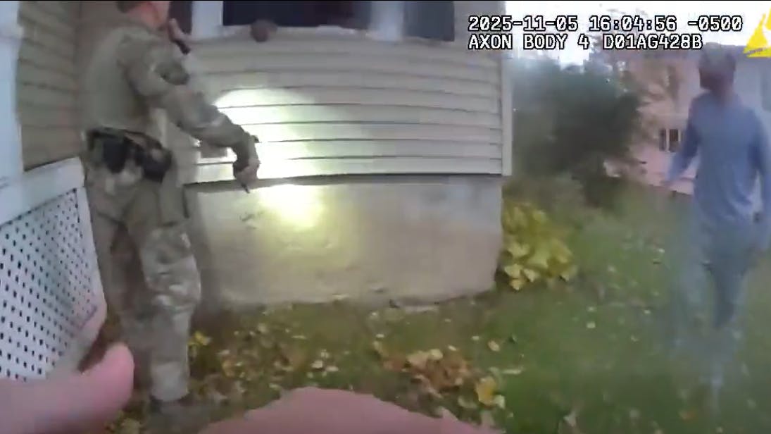 An Auburn, NY, police officer and a Cayuga County sheriff's deputy saved a man trapped inside a burning home Wednesday by pulling him through a first-floor window.