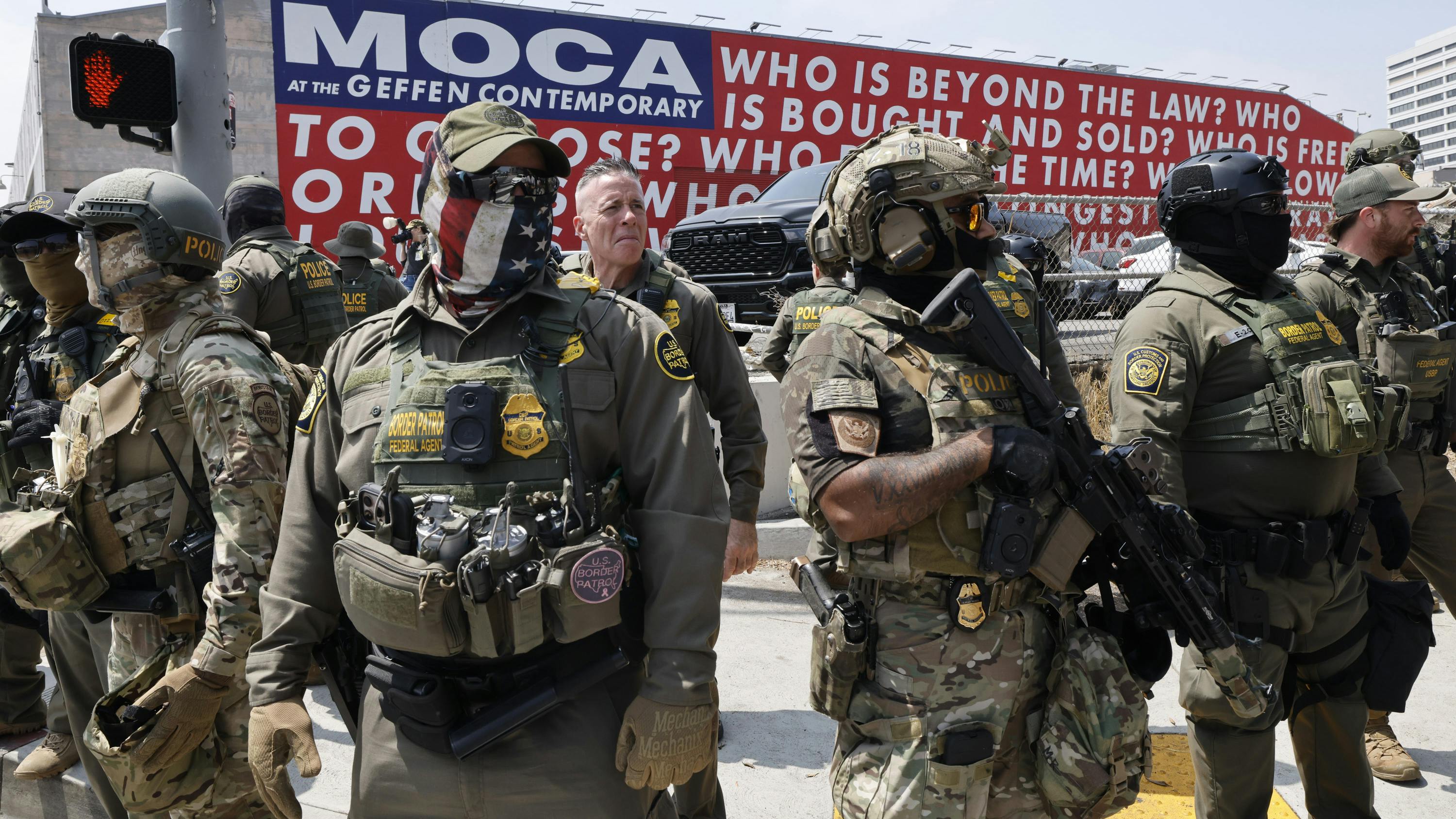 U.S. Border Patrol agents head to the Edward R. Roybal Federal Building in Los Angeles following a press conference by Gov. Gavin Newsom in August.