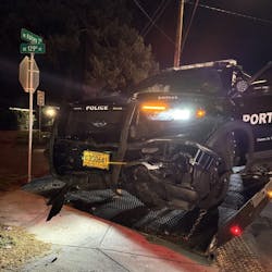The impact of a nearly head-on collision with an alleged drunken driver Saturday sent a Portland, OR, police SUV into a fence and a car parked in a nearby driveway. The impact of a nearly head-on collision with an alleged drunken driver Saturday sent a Portland, OR, police SUV into a fence and a car parked in a nearby driveway.