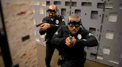 Officers are seen using the fats AR - Augmented Reality Weapons Training system.