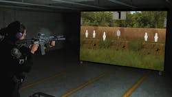 An officer is seen using the fats LIVE Hybrid Training System. An officer is seen using the fats LIVE Hybrid Training System.