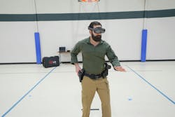 An officer is seen using the fats VR - Virtual Reality Training System. An officer is seen using the fats VR - Virtual Reality Training System.
