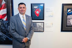 Bryan Cottrell seen next to his drawing, 'Honor.' Bryan Cottrell seen next to his drawing, 'Honor.'