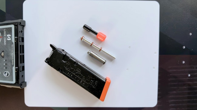 At the heart of the system is the SureStrikeMAG. It includes the Laser Ammo SureStrike laser cartridge and Smart DryFireMag. The DryFireMag allows laser training without resetting the trigger. When Lindsey used it, he found that the trigger felt exactly like his stock Glock trigger, except it did not require racking the slide for reset.