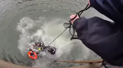 NYPD Harbor Unit Officers leap into the frigid East River to rescue someone in the water.