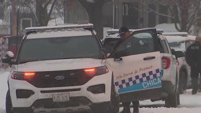 A Chicago police officer's body armor saved him after he was shot in the chest while trying to break up a fight.