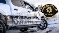 A Laramie County, WY, sheriff's deputy's cruiser was damaged when an overloaded semi rolled onto the vehicle. A Laramie County, WY, sheriff's deputy's cruiser was damaged when an overloaded semi rolled onto the vehicle.