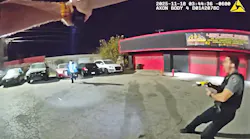 A suspect armed with a machete charges at Oklahoma City, OK, police officers.