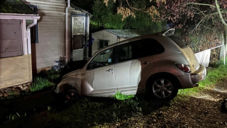 An alleged drunken driver crashed while making a U-Turn and accidentally called 9-1-1.