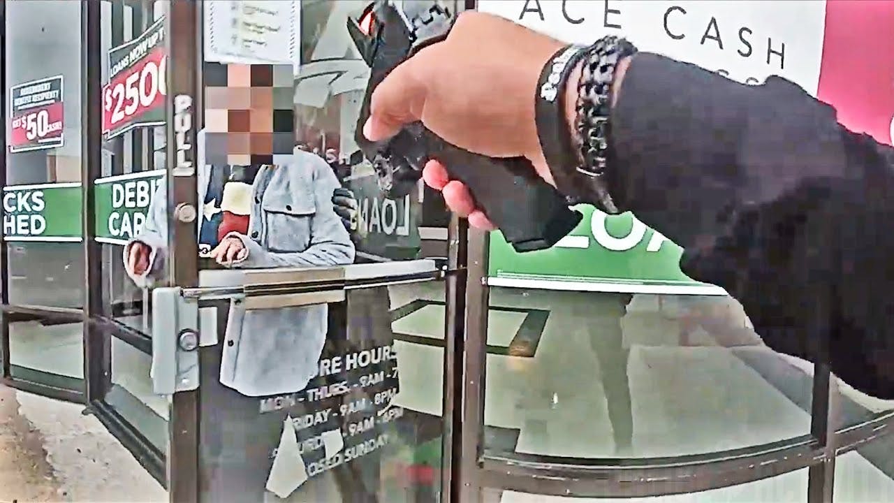 A Houston police officer confronts an armed suspect using a woman as a shield.