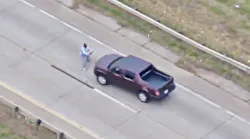An armed man fleeing Oklahoma City, OK, police was struck by a vehicle he tried to carjack.
