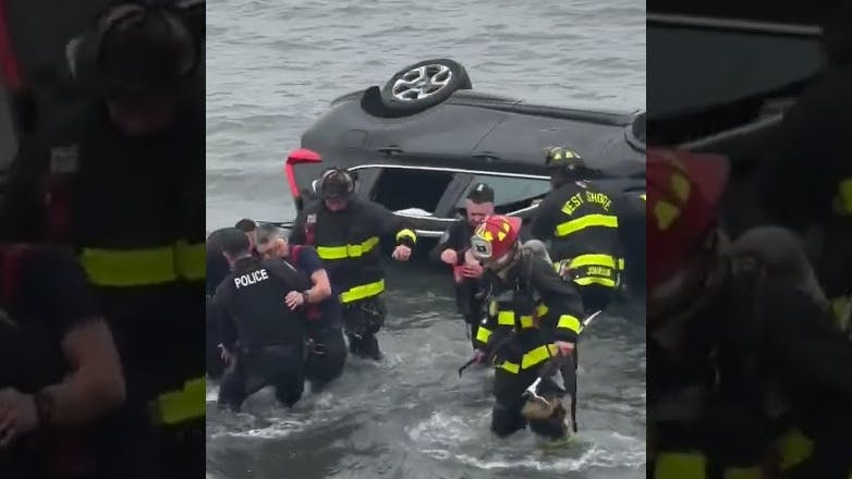 West Haven, CT, police help rescue a person after a crash into Long Island Sound.