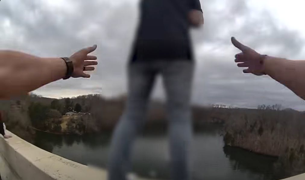 Tennessee Highway Patrol Trooper Jake Tizzard's daring rescue of a woman threatening to jump from a bridge.