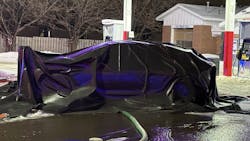Brooklyn Center, MN, firefighters used a special tarplike blanket to extinguish an electric vehicle fire at a gas station. Brooklyn Center, MN, firefighters used a special tarplike blanket to extinguish an electric vehicle fire at a gas station.
