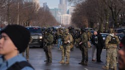 Law enforcement agents stand on the scene of a shooting at E 34th St. and Portland Ave. in Minneapolis on Jan. 7. Law enforcement agents stand on the scene of a shooting at E 34th St. and Portland Ave. in Minneapolis on Jan. 7.
