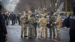U.S. Border Patrol and law enforcement agents gather at the scene of a shooting near E. 34th Street and Portland Avenue in Minneapolis on Jan. 7. U.S. Border Patrol and law enforcement agents gather at the scene of a shooting near E. 34th Street and Portland Avenue in Minneapolis on Jan. 7.