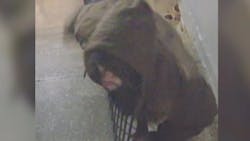 Security camera footage from a home in the 400 block of East Rockland Street shows a man approaching the front steps and attempting to take a package, police said. Security camera footage from a home in the 400 block of East Rockland Street shows a man approaching the front steps and attempting to take a package, police said.