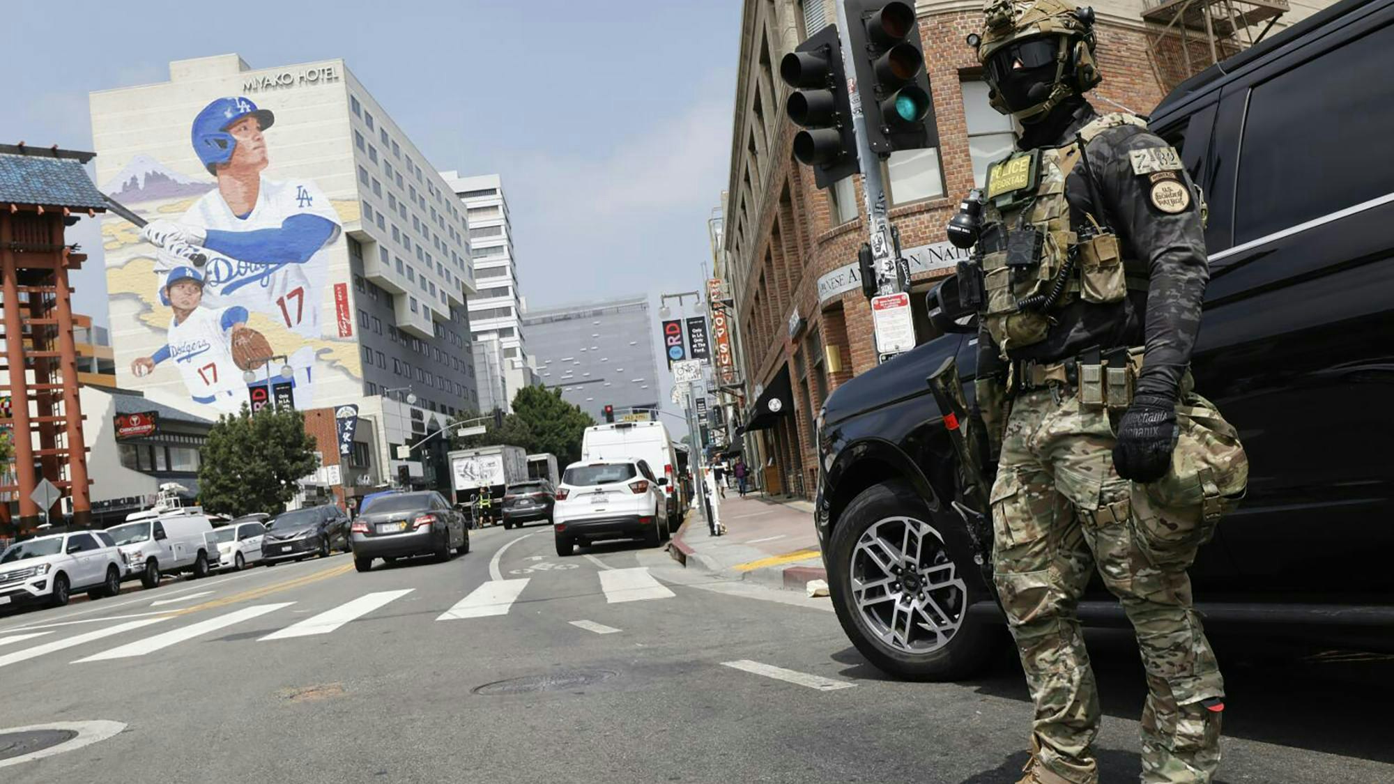 U.S. Border Patrol makes a show of force outside the Japanese American National Museum where California Gov. Newsom was holding a redistricting news conference on Aug. 14, 2025, in Los Angeles.