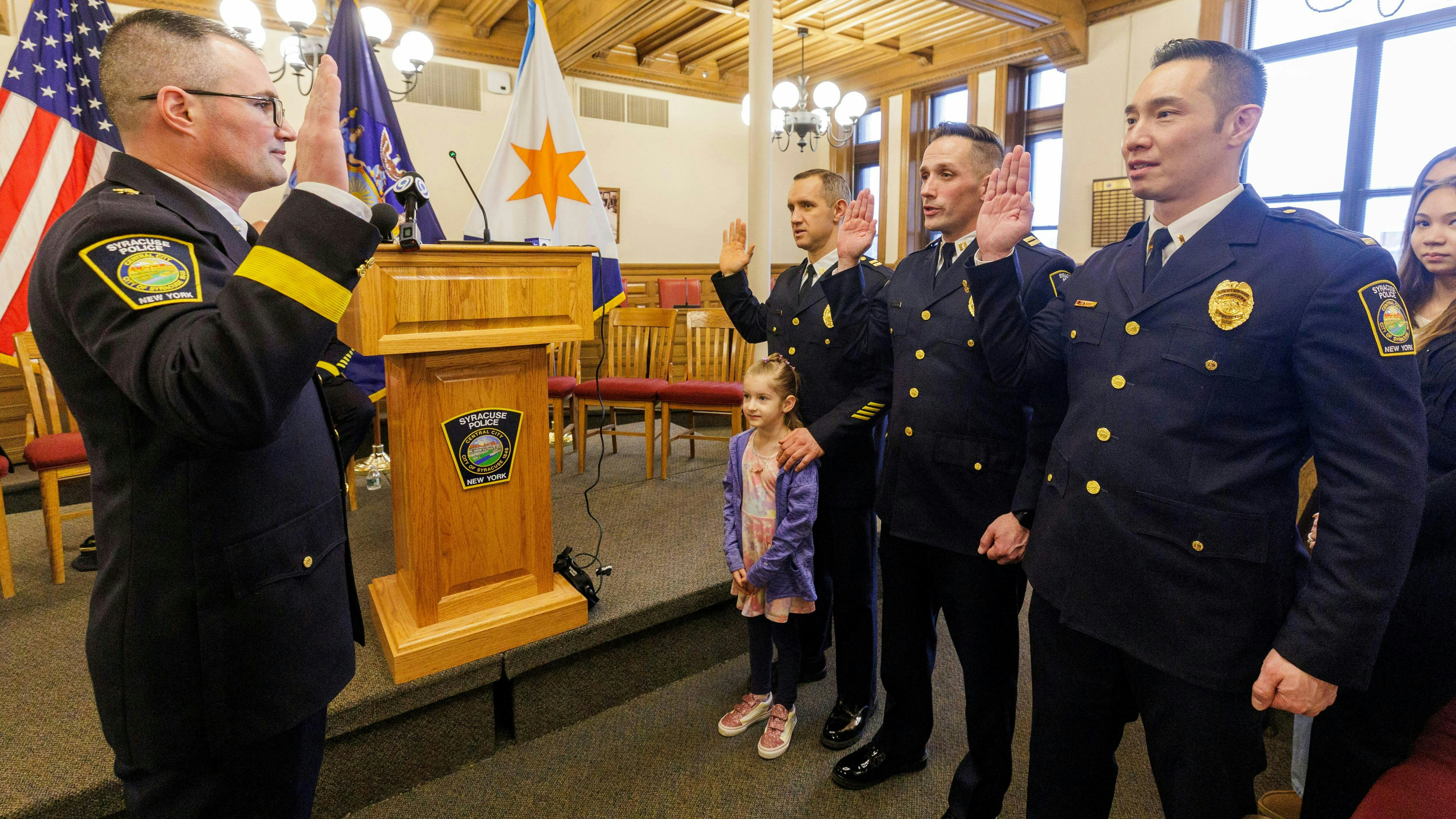 The new Syracuse Police chief Mark Rusin swears in his new deputy chiefs David Metz, James Milana and Jason Tom at the Syracuse Common Council chambers Wednesday, January 14, 2026. He replaces Joseph Cecile who has served as chief for four years.