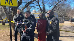 Atlanta Police Department officials speak to reporters after an officer working an off-duty security assignment opened fire during a shooting outside a city warming center.
