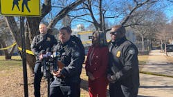 Atlanta Police Department officials speak to reporters after an officer working an off-duty security assignment opened fire during a shooting outside a city warming center. Atlanta Police Department officials speak to reporters after an officer working an off-duty security assignment opened fire during a shooting outside a city warming center.