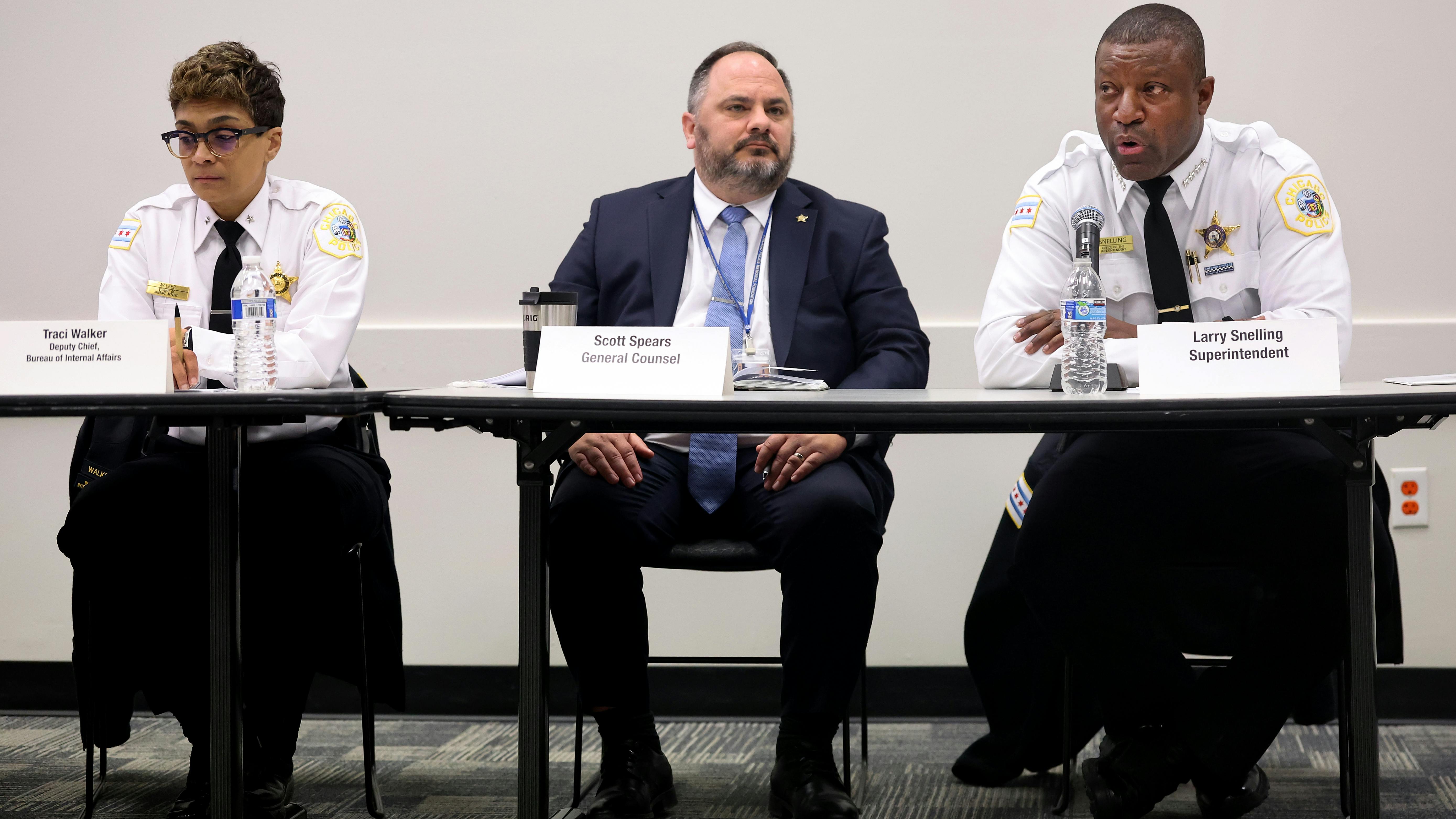 Chicago Police Deputy Chief Traci Walker, of internal affairs, from left, Scott Spears, CPD&rsquo;s chief legal counsel, and police Superintendent Larry Snelling attend a monthly Chicago Police Board meeting on Feb. 20, 2025.