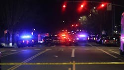 Portland police blocked streets near the Lloyd Center in Northeast Portland late Monday as they searched for a person who opened fire on police, injuring two officers. Portland police blocked streets near the Lloyd Center in Northeast Portland late Monday as they searched for a person who opened fire on police, injuring two officers.